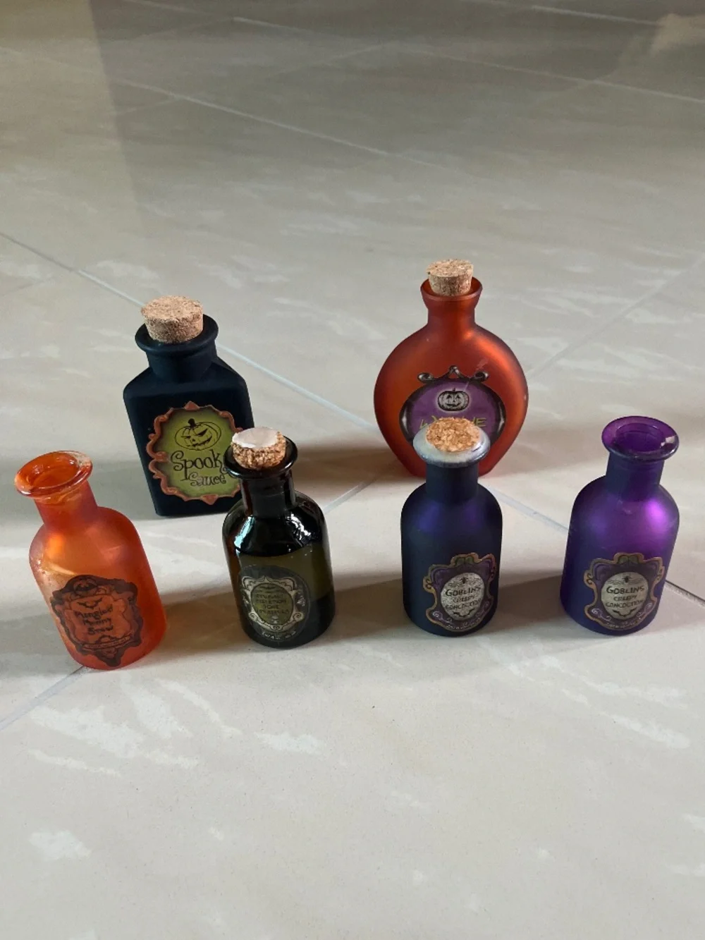 0010 Six-piece Halloween witch’s apothecary and potion bottle décor lot